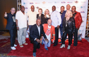 Lauren's Kids Gala photo with Lauren, Ron, 3 honorees, emcee Paul Castronovo and Dolphins alumni
